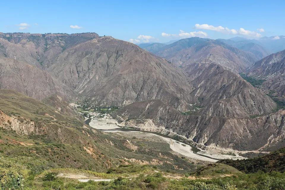 The folded, dry slopes of the Chicamocha Canyon with the river winding along the bottom.